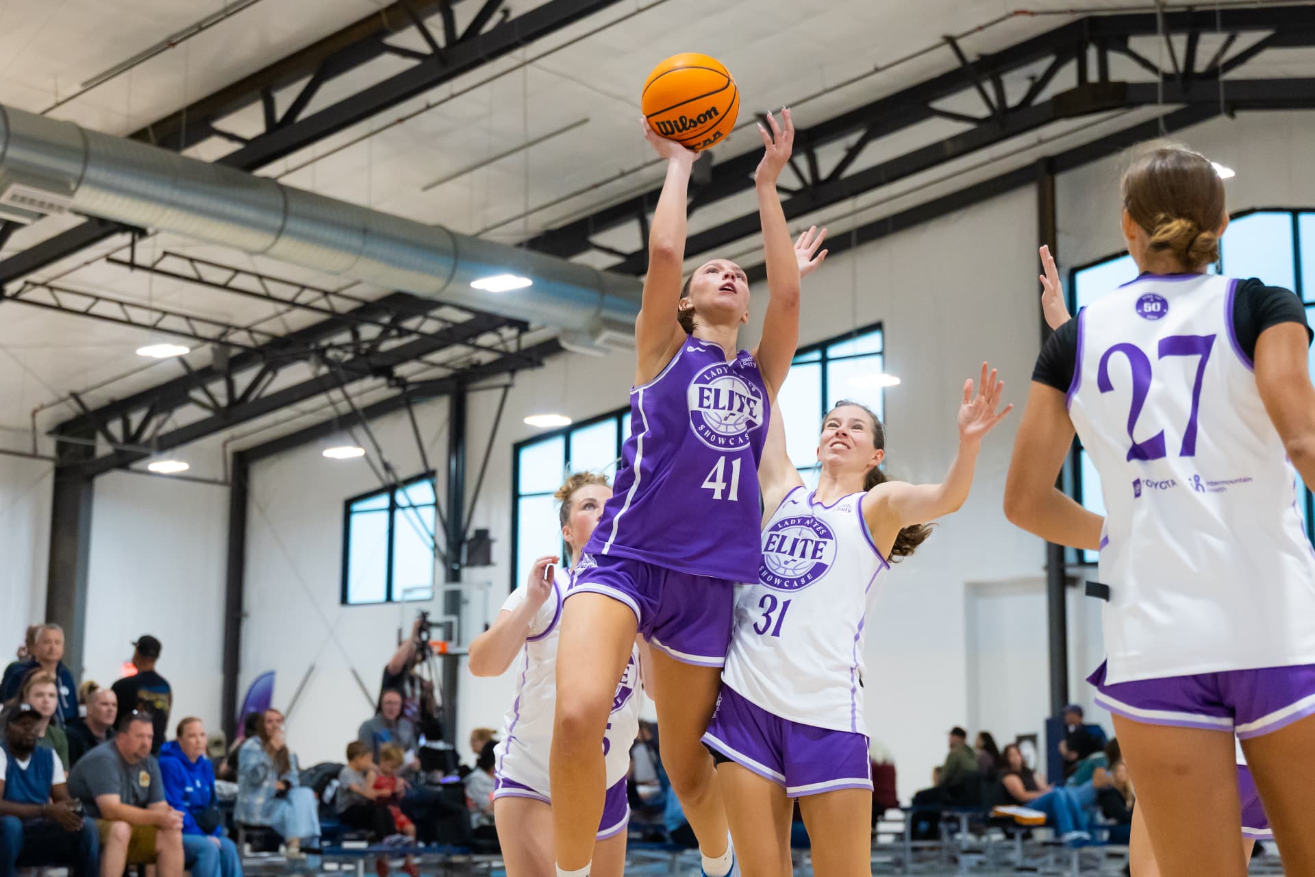 Lady Notes player going up for a shot